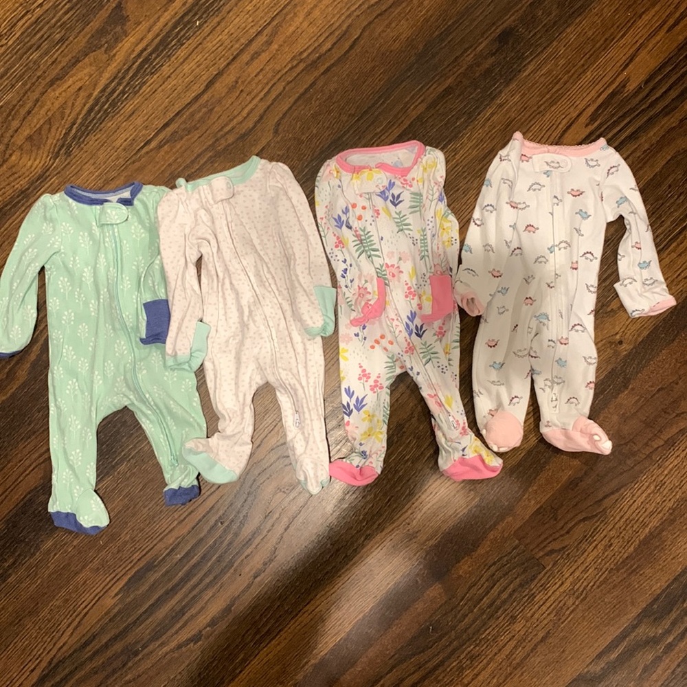 Four newborn footie pjs.